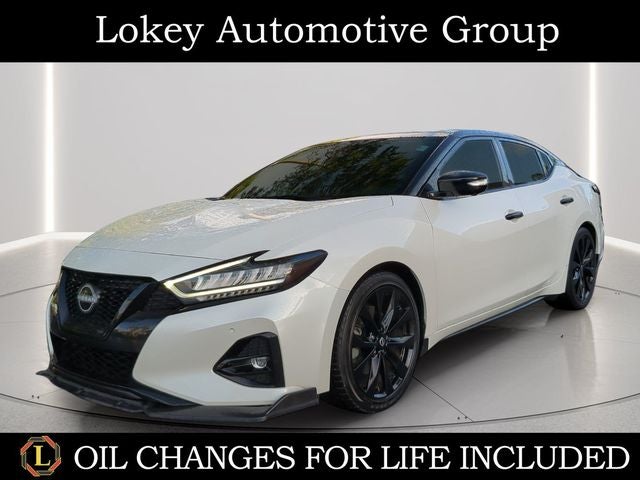 2023 Nissan Maxima SR in Pearl White Tricoat — front three-quarter view